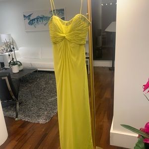the brand is Aiden Mattox. It’s is a lime green dress and runs in a size 8